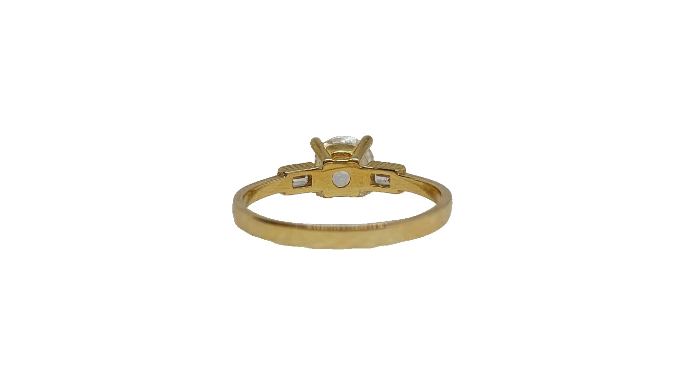 9ct Yellow gold round 4 claw cubic zirconia baguette-cut on shank ring
