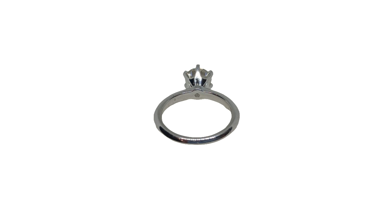 Sterling silver 18ct rhodium plated 6 claw moissanite with a plain knife edge shank ring