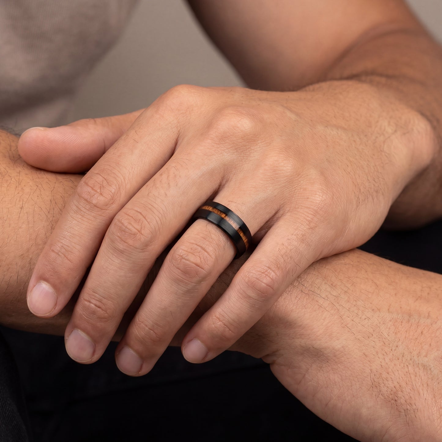 Black tungsten ring with cherry wood inlay