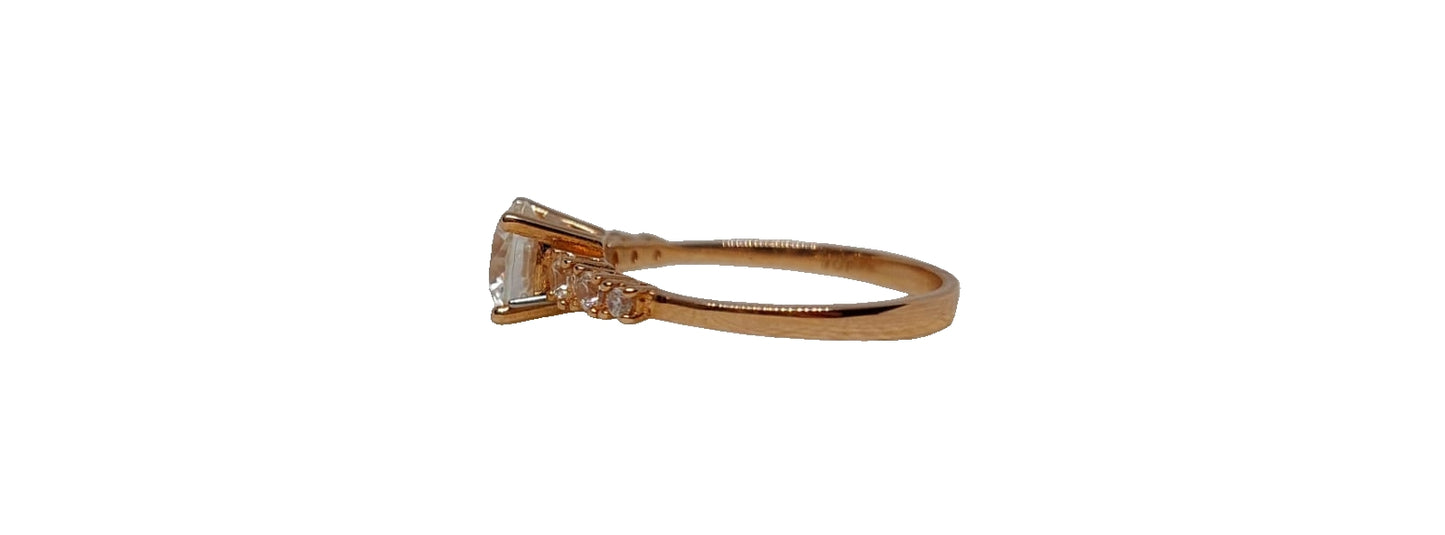 9ct Rose gold 4 claw round cubic zirconia with 6 smaller cubic zirconia on shank ring