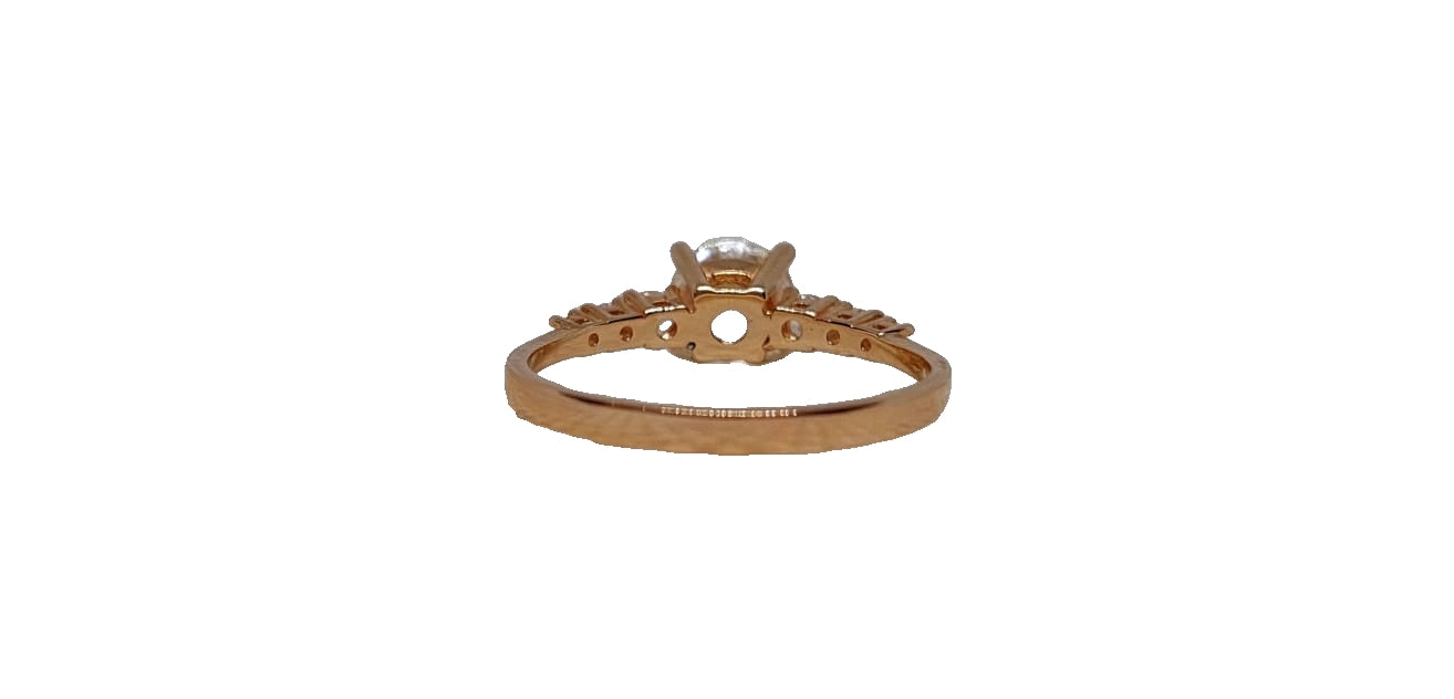 9ct Rose gold 4 claw round cubic zirconia with 6 smaller cubic zirconia on shank ring
