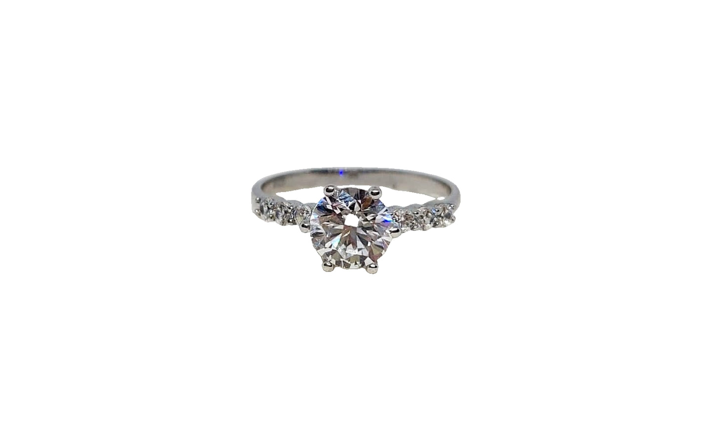 9ct White gold 6 claw round cubic zirconia with 6 smaller cubic zirconia on shank ring