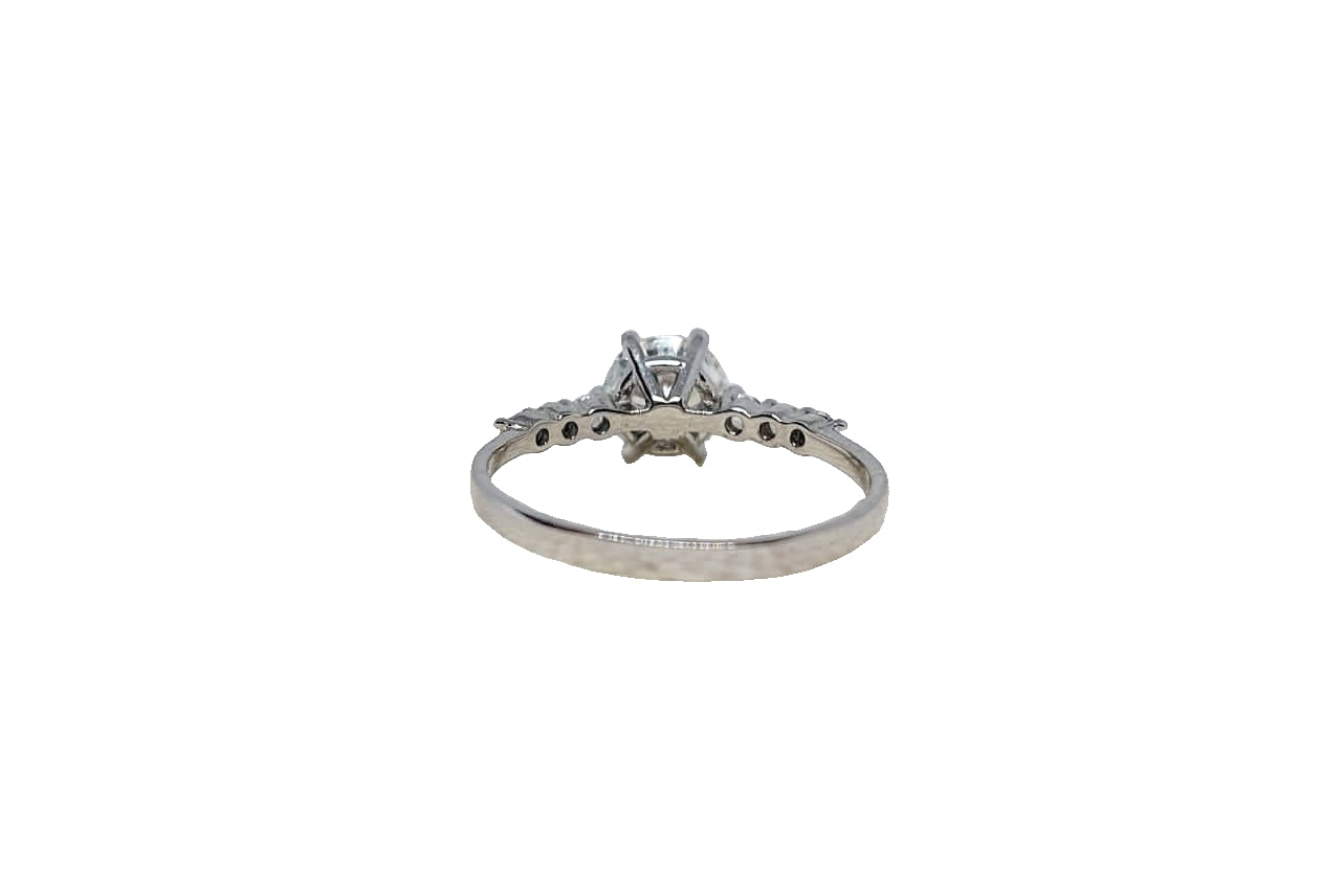 9ct White gold 6 claw round cubic zirconia with 6 smaller cubic zirconia on shank ring
