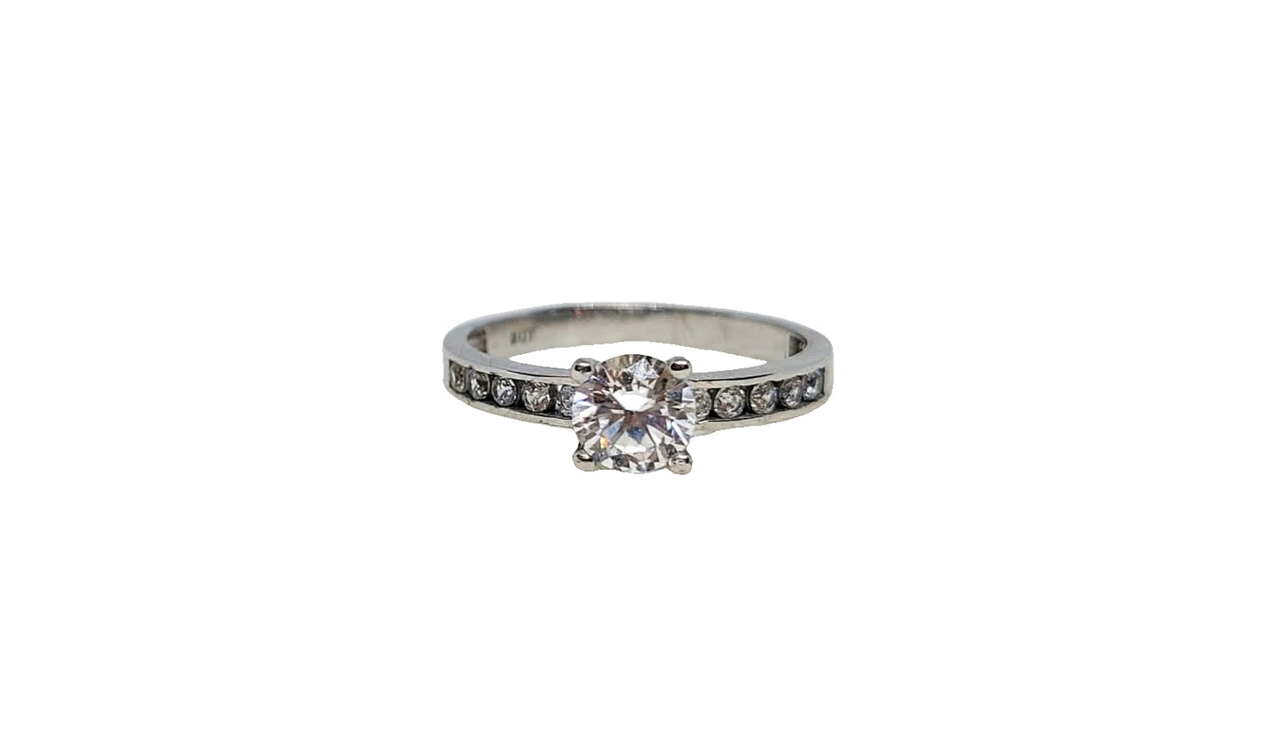 9ct White gold cubic zirconia 4 claw with cubic zirconia channel setting on shank ring