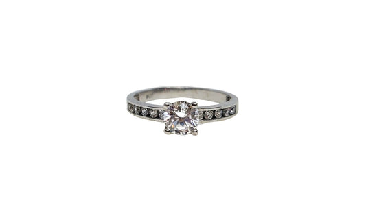 9ct White gold cubic zirconia 4 claw with cubic zirconia channel setting on shank ring