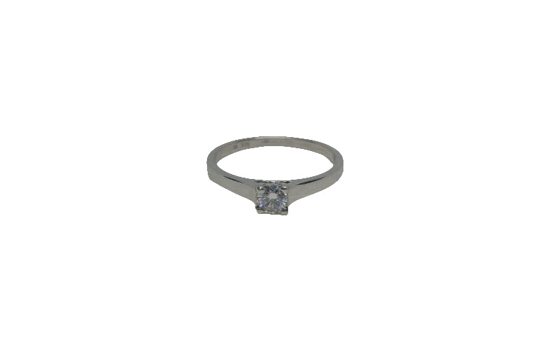 Sterling silver 18ct rhodium plated moissanite 4 claw classic setting with a rounded shank ring