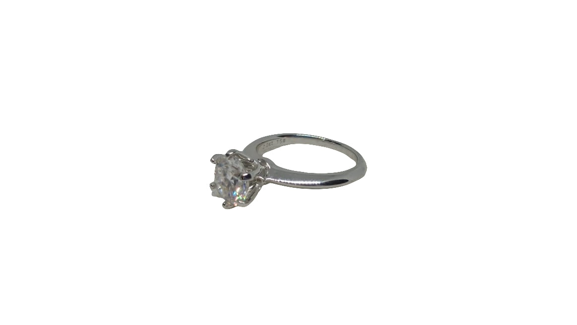 Sterling silver 18ct rhodium plated 6 claw moissanite with a plain knife edge shank ring