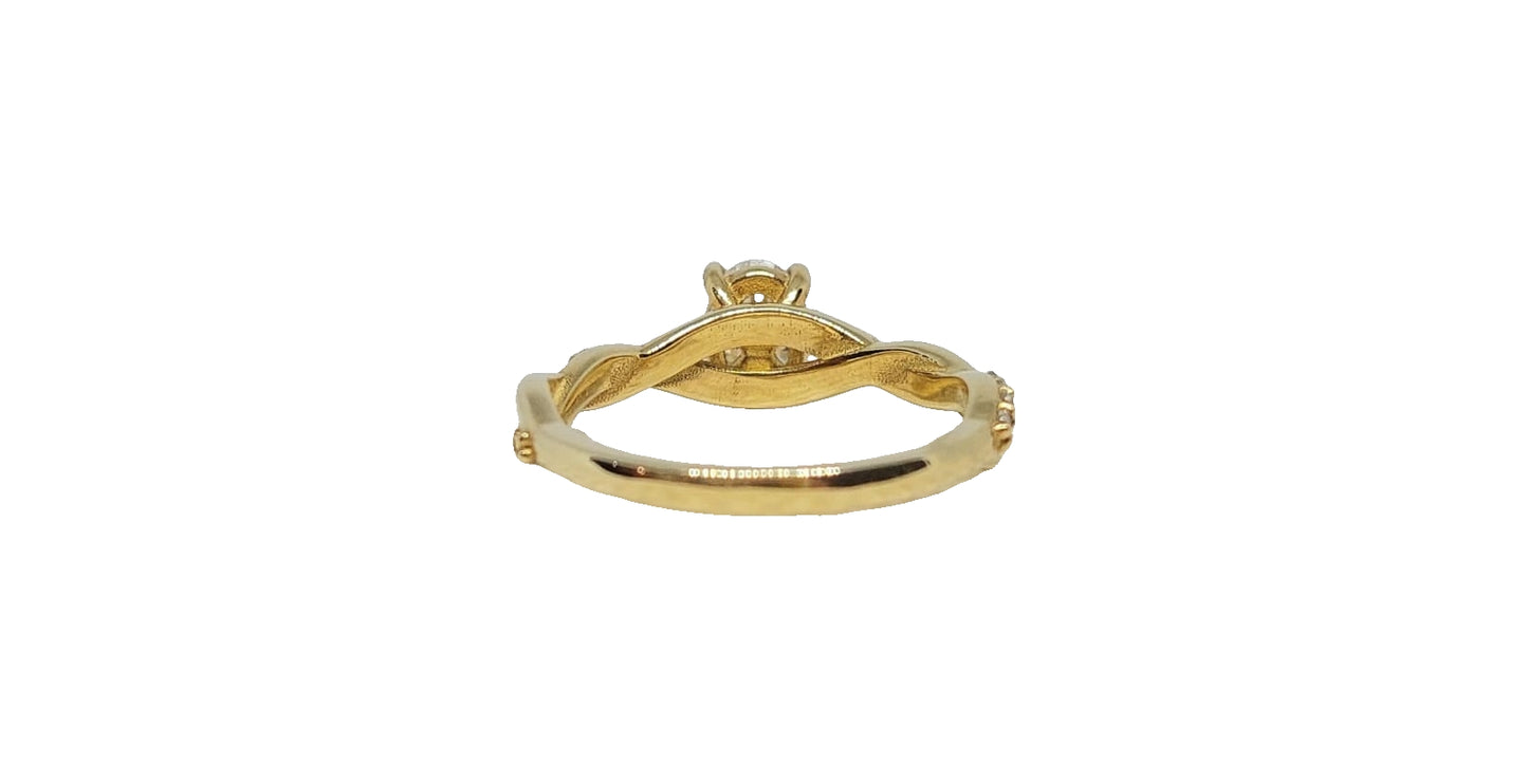 9ct Yellow gold oval cut moissanite plain and moissanite crossover shank ring