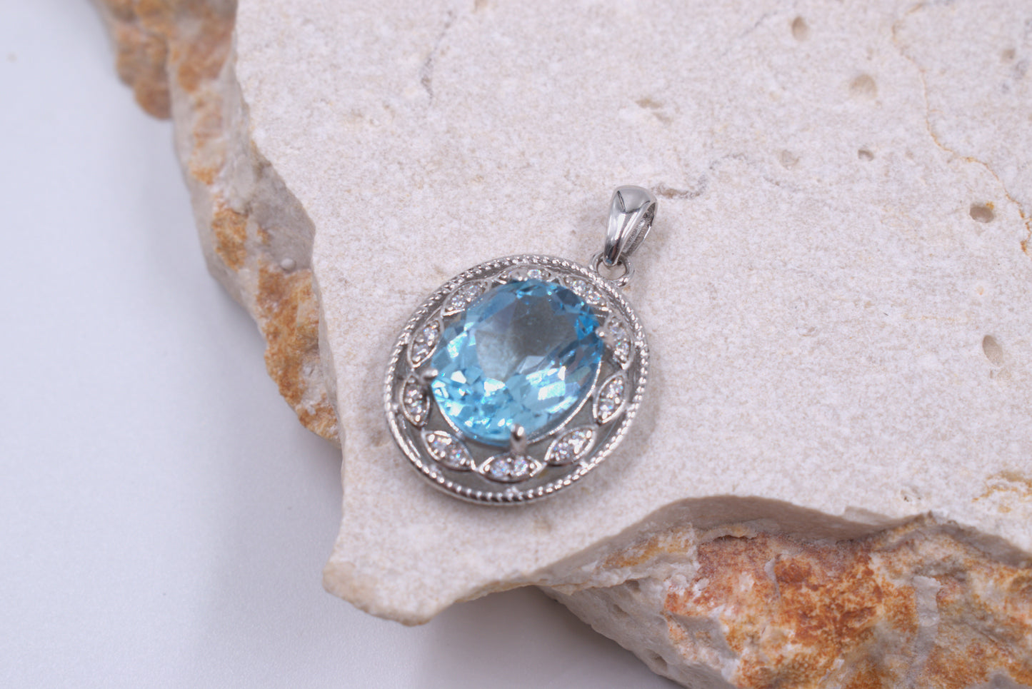 Sterling Silver Oval Blue Topaz With a fancy Halo (November Birthstone)