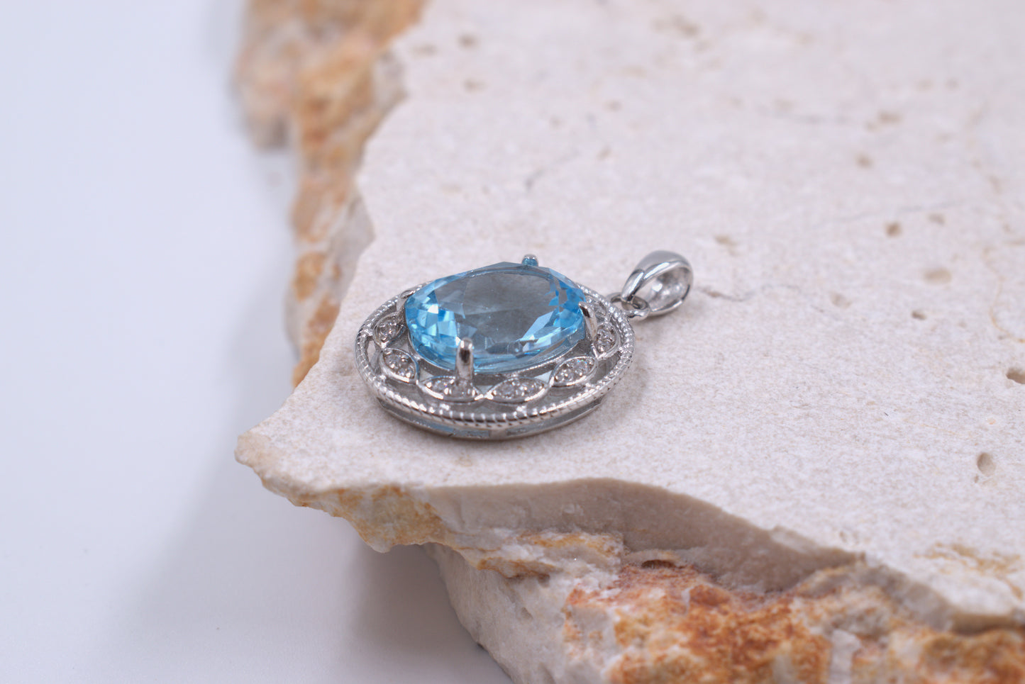 Sterling Silver Oval Blue Topaz With a fancy Halo (November Birthstone)