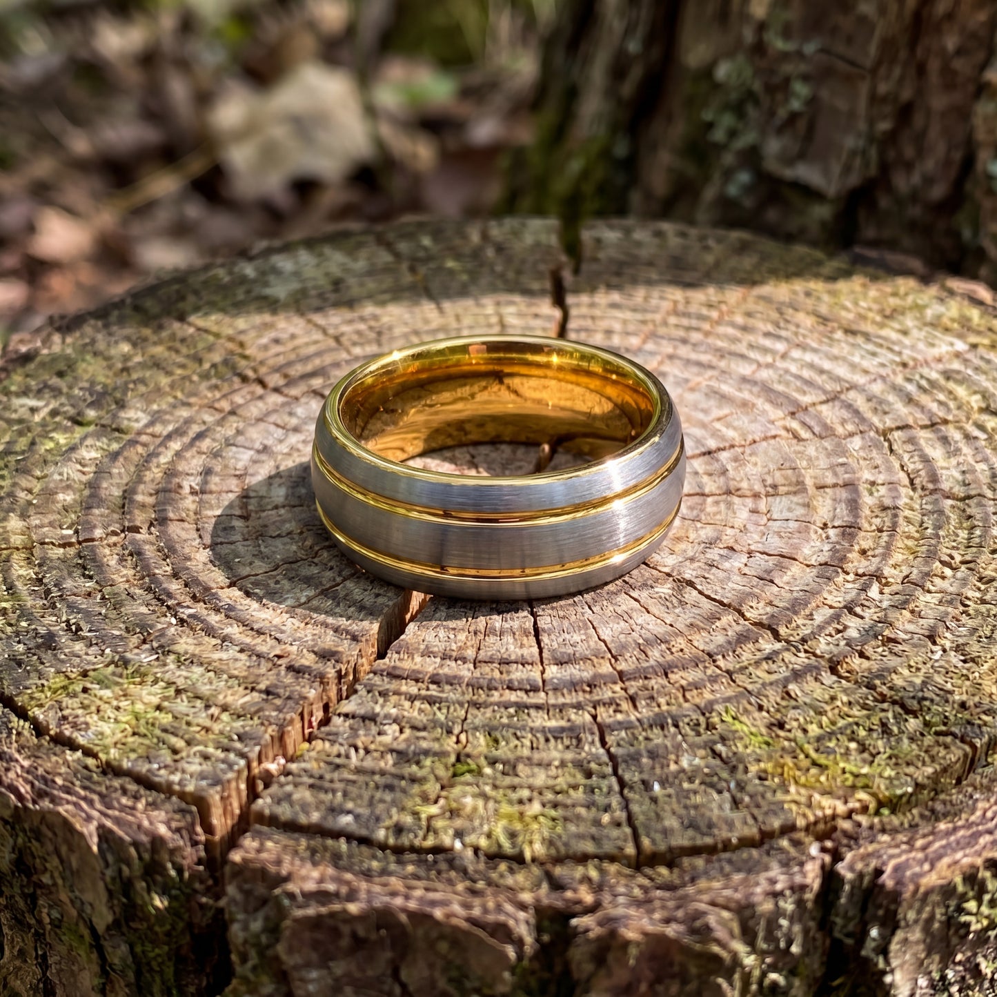 Grey tungsten ring with yellow gold