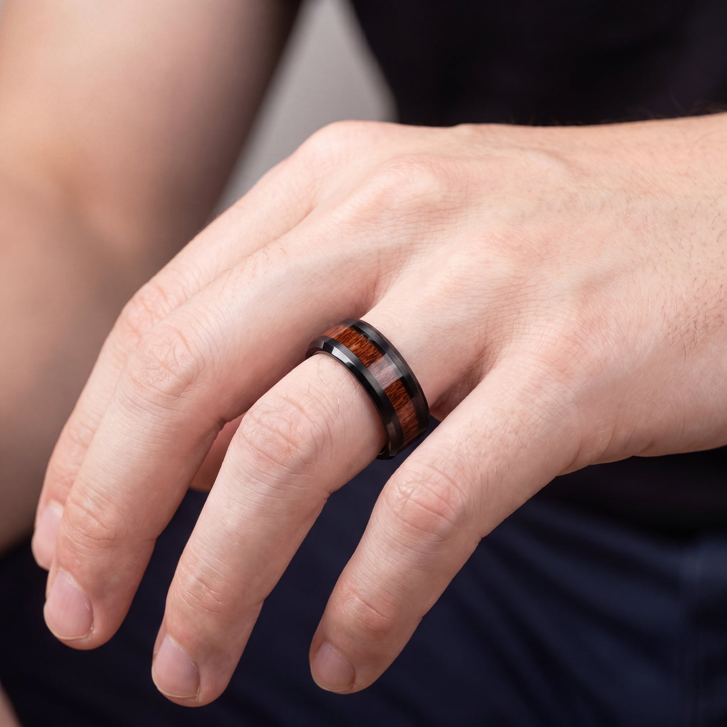 Black tungsten ring with cherry wood inlay