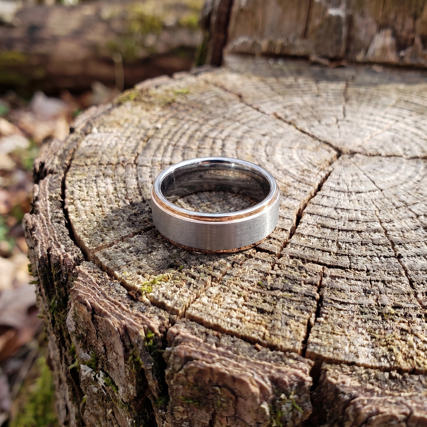 Dark grey tungsten ring with rose gold details