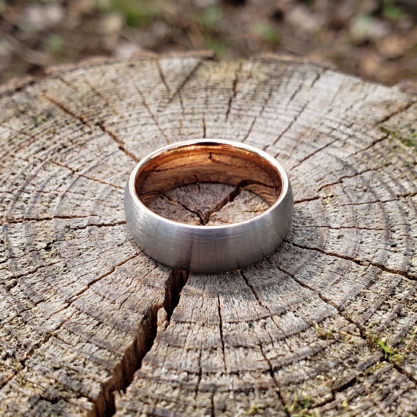 Grey tungsten ring with rose gold detail