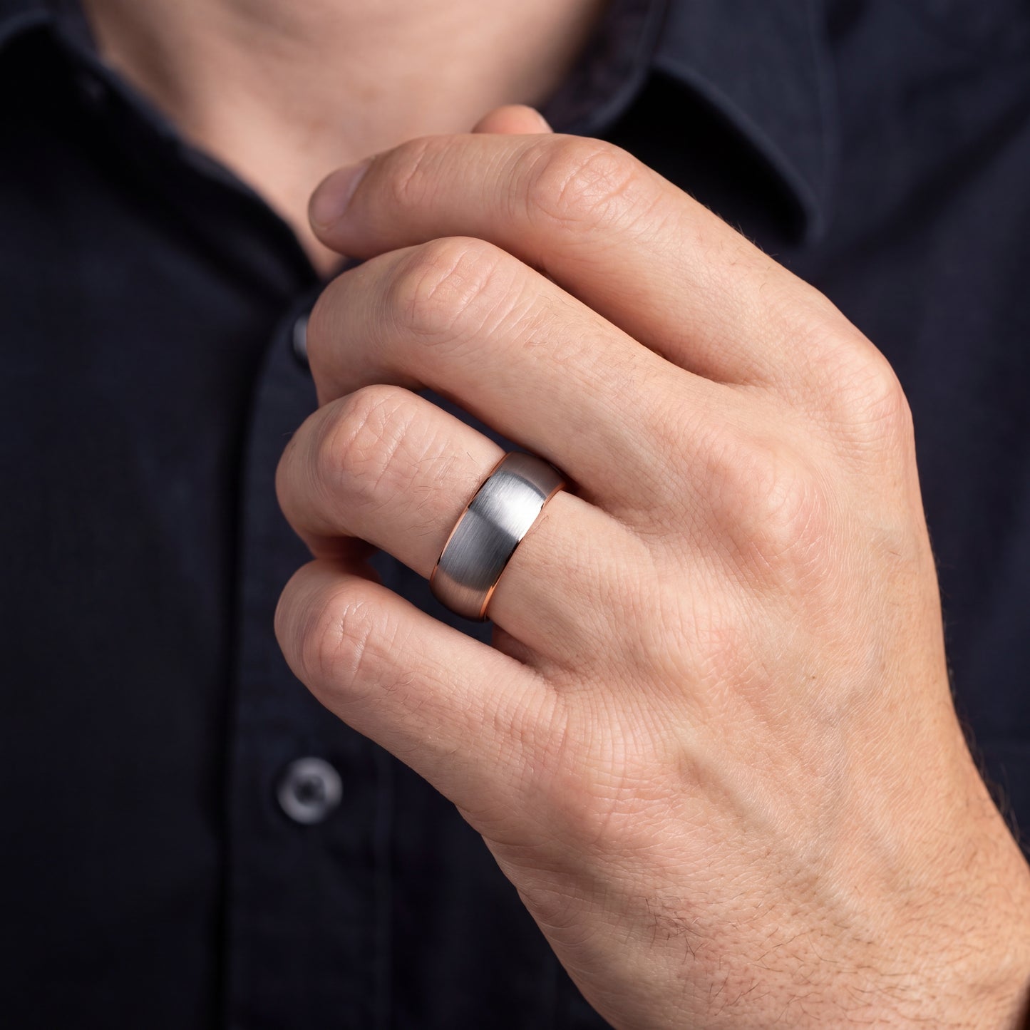 Grey tungsten ring with rose gold detail
